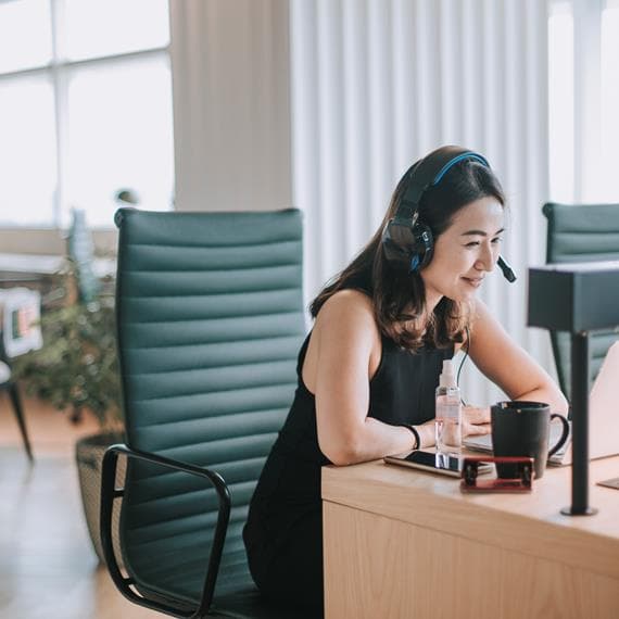 Lady sitting with a headset